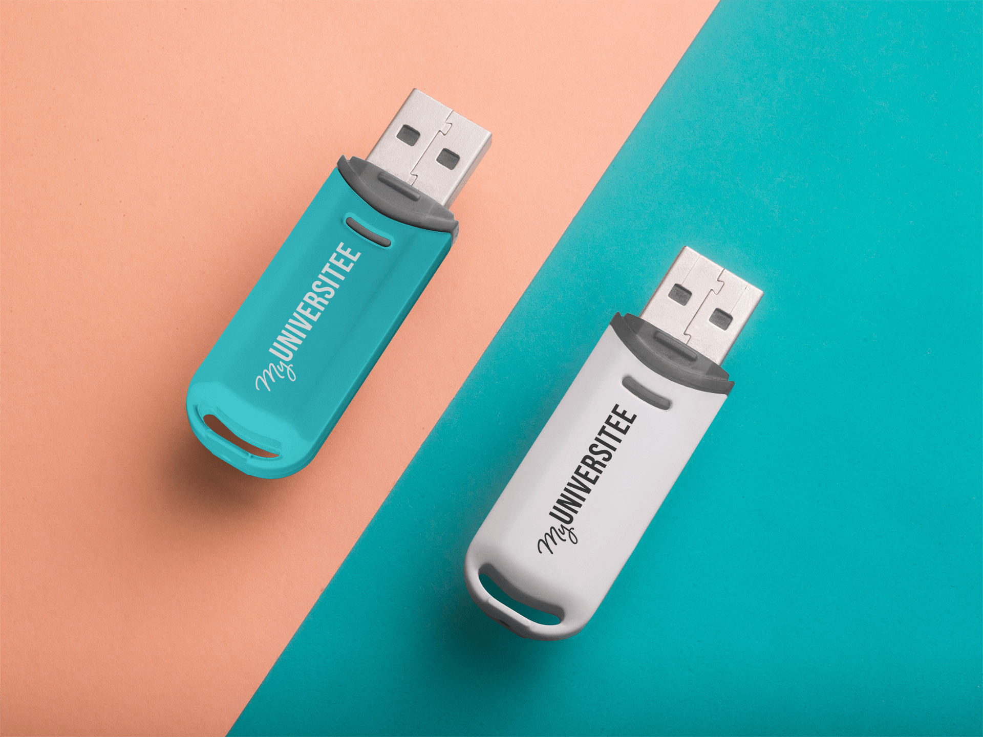 pair-of-usb-flash-drives-mockup-lying-on-turquoise-and-orange-surfaces-a6536